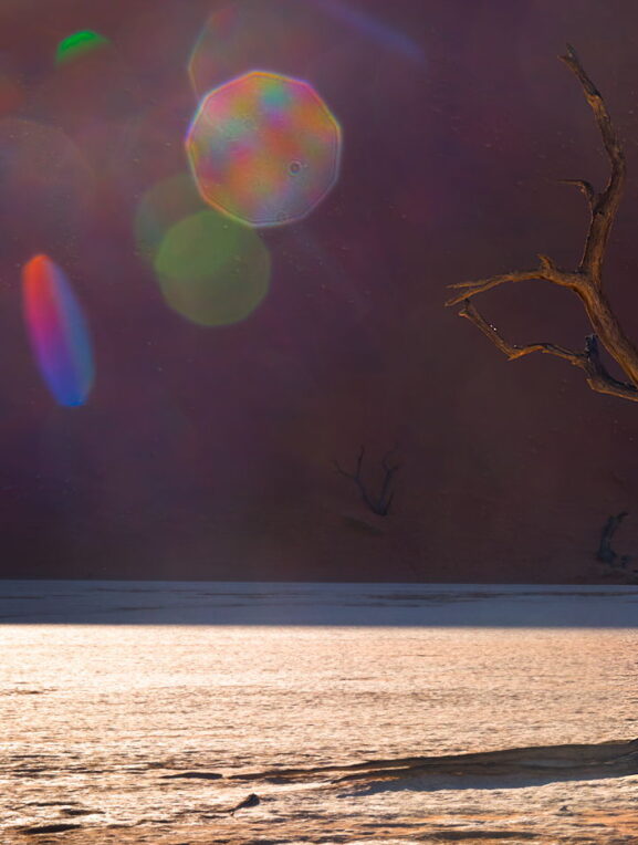 Kolorowe flary na tle wydmy, Namibia